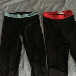 Two Nike Pro Leggings